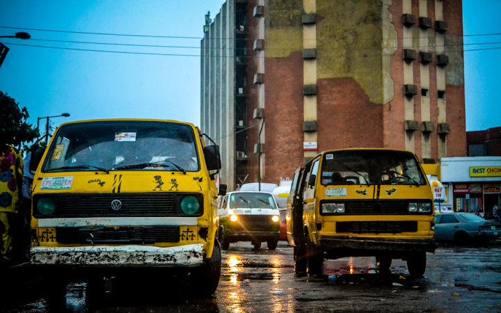 Yellow danfo buses on a Lagos street